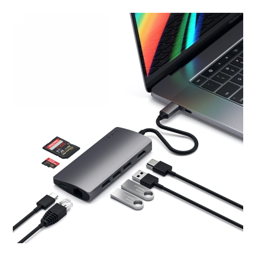 Close-up of the Satechi adapter with three USB-A ports and a card reader.