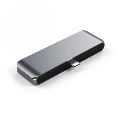 Close-up of the Satechi hub showing USB-C and jack ports.