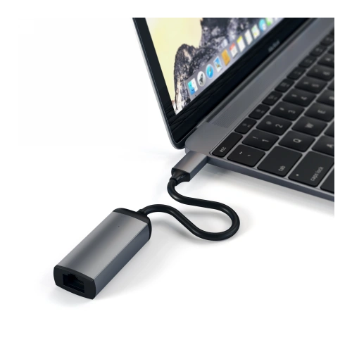 Close-up view of the Satechi Type-C adapter showing ports and an elegant casing in space gray.