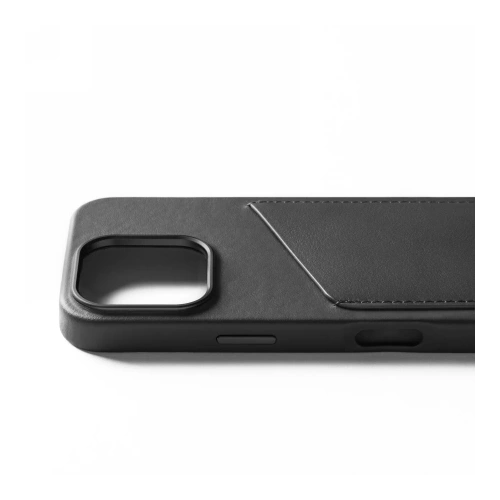 Etui Mujjo na biurku z kartami, prezentujące funkcję portfela i elegancki design.