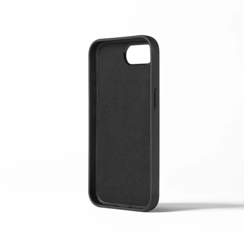 Zbliżenie na naturalną sk&oacute;rę etui Mujjo, ukazujące wysoką jakość materiału.