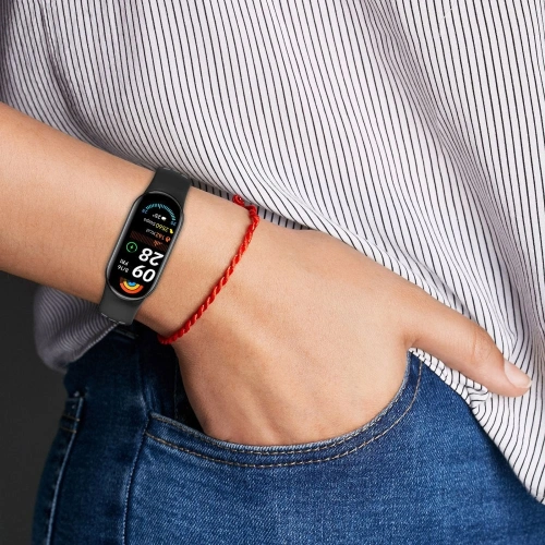 Silicone strap for Xiaomi Smart Band 8, 9, and 10 in an elegant black shade.