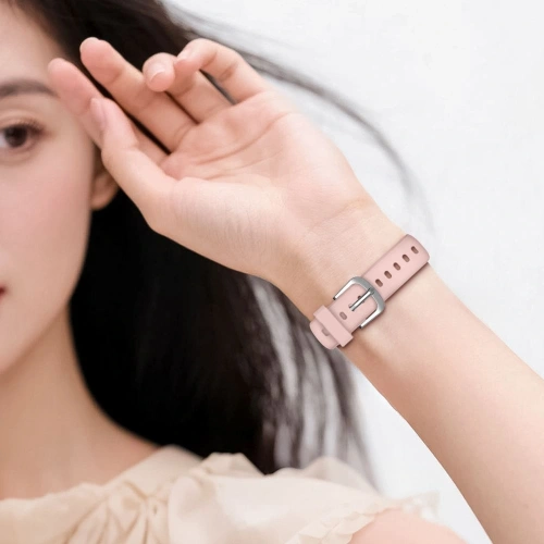 Brățara într-o nuanță de roz, perfectă pentru utilizare zilnică cu Xiaomi Smart Band.