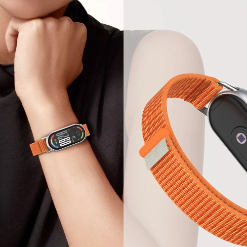 Pasek do smartbanda Xiaomi z nylonu, pomarańczowy z szarymi elementami.