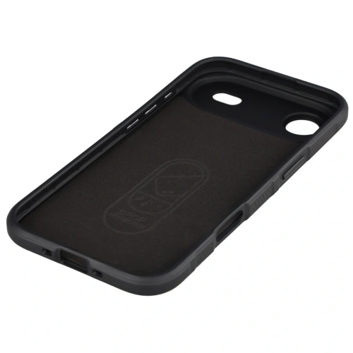 Czarne etui Bizon Case Tur na stole, podkreślające jego elegancki design