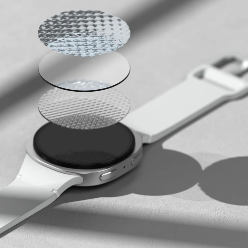Aplikacja szkła na Samsung Galaxy Watch 8 z użyciem dołączonej ramki montażowej.