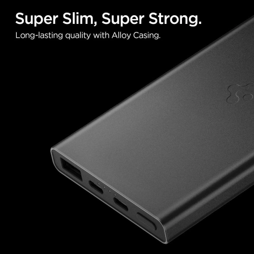 Stylowy czarny powerbank Spigen Essential EA2210 na tle biurka.