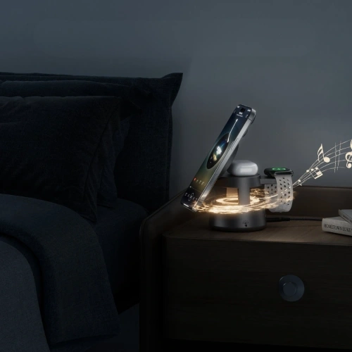 Stacja ładująca 4smarts Aura Sound Qi2 z widokiem na trzy jednocześnie ładowane urządzenia.